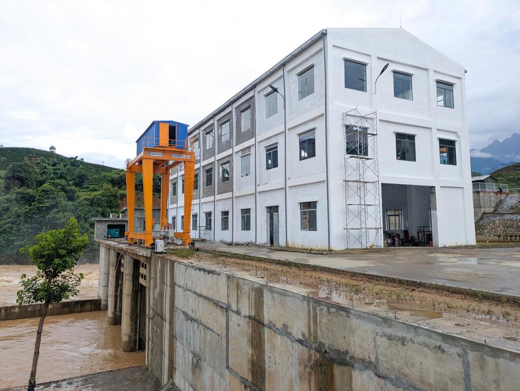 Inside powerhouse of Na An Hydropower Plant with generators and Kaplan turbines